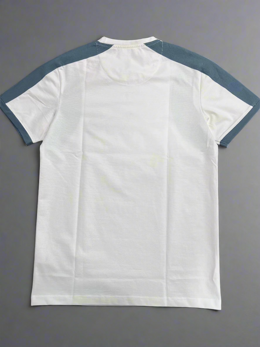 White t-shirt with blue accents on a wooden surface